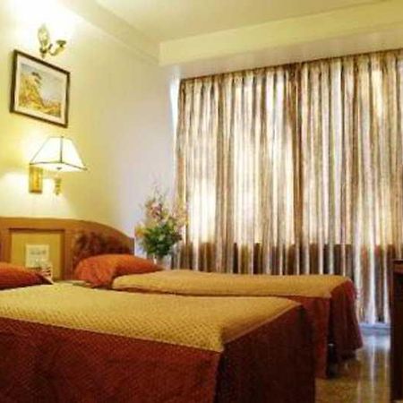 Hotel Mandakini Ambience Pune Phòng bức ảnh