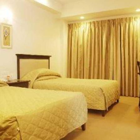 Hotel Mandakini Ambience Pune Phòng bức ảnh