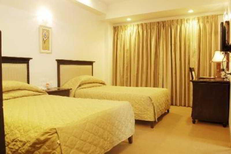 Hotel Mandakini Ambience Pune Phòng bức ảnh